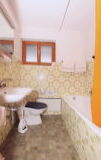 indoor, floor, wall, plumbing fixture, bathroom, tap, shower, mirror, bathroom accessory, toilet, countertop